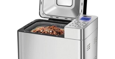 Panificadora 68456 Edel Unold con tapa abierta y mezcla de ingredientes